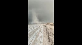 Tornado spotted in open field in Xinjiang, China