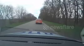 Speeding car splits in half during police stop in Yelabuga, Russia