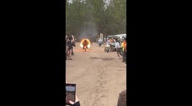Daring Guy on his mini-bike jumps into lake while on fire *Incredible Stunt*