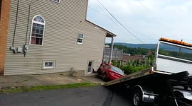 Shocking aftermath footage shows vehicle crashed through building