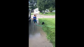 Water fight with his best bud.
