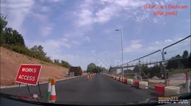 Pedestrian crosses infront of car whilst on Mobile Phone