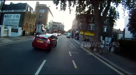 Cyclist collides with taxi leading to row