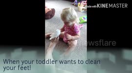 When your toddler wants to clean your feet!