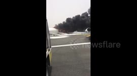 Emirates plane engulfed in flames after crash-landing