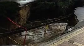 Sinkhole opens up in the middle of the road in China