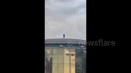 UK: Tom Cruise is spotted standing on the roof of the BFI IMAX in London