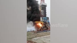 Oil rig engulfed in flames before collapsing in Russia