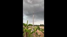 Dust devil tornado tears apart home as it rips through field