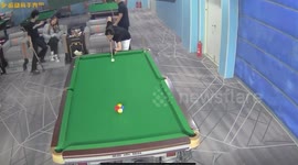 Pool player sinks four balls with epic trick shot