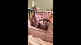 Baby relaxing in mini recliner