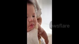 Genius dad uses modified bottle to easily feed baby water