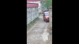 Car tips over while turning into alley in Hebei, China