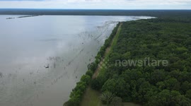 Bussey Brake Reservoir from above.  It was on a cloudy day. With plenty of fishers.