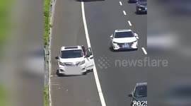 China: Centimeters to Death on Qingdao Highway as Driver Risks Lives for Child's Bathroom Break
