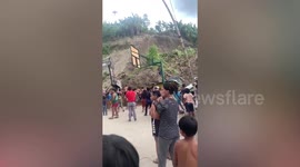 Landslide falls onto fairground killing worker in the Philippines