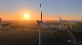 Wind farm during a sunset in Cambridgeshire also known as the Golden hour