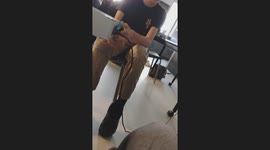 Person retreats after sparks fly while trying to cut live cable