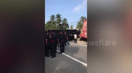 Nine police officers killed when lorry collides with truck in Malaysia