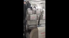 Passenger sparks panic by opening plane door 'to get some fresh air' in China