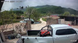 Drone lifts motorcycle and drops cart in Liaoning, China