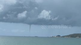 Waterspout tornado moves across bay in southern Thailand