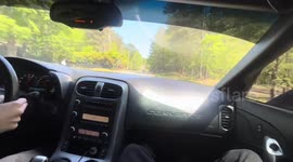 Inexperienced Sportscar Driver Crashes At Curve Top