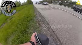 Dog Rescued From Busy Highway Leaps Into Police Cruiser