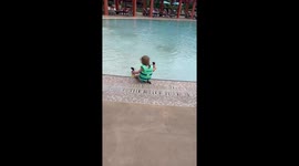Pool fun: Little girl playfully takes a dip after wondering what’s underwater