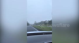 Wind turbine stuck under bridge after truck misses turn