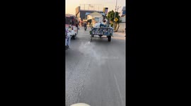 DIY repair trailer scrapes along ground in Cambodia