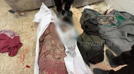 Newborn among dead as Israeli airstrike hits warehouse in central Gaza