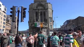 2/3 Celtic fans gathered for their traditional unofficial title party in the city centres trongate, fireworks, flares , a police helicopter with the bus shelters dismantled