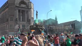 3/3 Celtic fans gathered for their traditional unofficial title party in the city centres trongate, fireworks, flares , a police helicopter with the bus shelters dismantled
