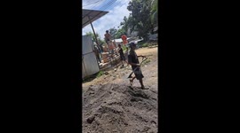 Boy Drops Bag of Sand