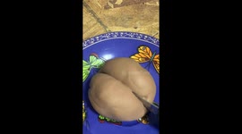 Manipulating putty or clay squishy and cutting through it, pulling, shaping it