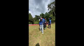 Paragliders bungle takeoff on top of hill