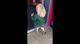 Little girl joyfully enters toy shop but gets terrified of the range mascot