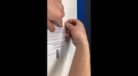 How to remove tape from paper without ripping it