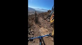 Biker loses balance and falls during downhill ride in San Felipe, Chile