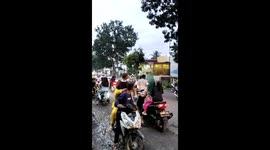 Motorcycle crashes into restaurant after avoiding tricycle in Binjai, Sumatra, Indonesia