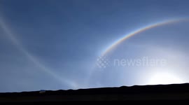 Strange white line and upper halo shinning brightly in the skies over Highland Scotland today.