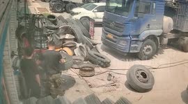 Foam blown through the air land's squarely on mechanic's head