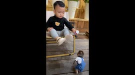 1 year old baby breastfeeds baby Pika monkey, so cute and adorable