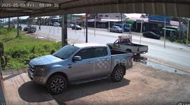 Motorcycle rider hits truck and somersaults into trailer