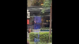 Tourist in a mankini heads towards Bangkok red light plaza