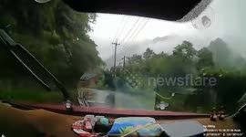 Rock falls onto moving car in Taiwan