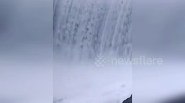 China: Dramatic River Rescue Saves Two Fishermen Trapped By Raging Waters