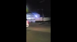 Dog seen hanging on car side mirror while driving in Ciudad Acuña, Mexico