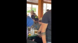 Lady Gaga tucks into budget food at Singapore hawker market